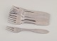 Georg Jensen 
"Mitra," a set 
of nine cake 
forks.
Stainless 
steel.
Marked.
From the ...