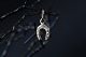 Pendant for necklace designed as a horseshoe. 14 carat ...