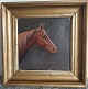 Framed oil 
painting on 
canvas. 
Portrait of 
horse in 1932. 
In good 
condition. 
Dimensions: 27 
x 27 cm.