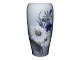 Royal 
Copenhagen vase 
with blue and 
white flowers.
Please note 
that this item 
is exclusively 
...