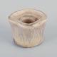 Edith Sonne for 
Saxbo, Denmark.
Small ceramic 
candlestick. 
Glaze in yellow 
and 
sand-colored 
...