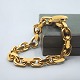 Frantz 
Hingelberg gold 
jewellery.
A wide/heavy 
bracelet of 14k 
gold.
L. 22,5 cm. W. 
10 ...