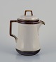 Bing & Grøndahl 
"Tema". Large 
coffee pot in 
stoneware.
From the 
1970s.
Marked.
In perfect ...