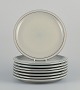 Bing & Grøndahl 
"Colombia". A 
set of eight 
dinner plates 
in stoneware.
1970s.
Model: ...