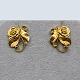 Georg Jensen 
gold jewellery.
Georg Jensen; 
Pair of 
earrings made 
of 18k gold no. 
305.
2 cm x ...