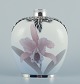 Royal 
Copenhagen, Art 
Nouveau vase in 
porcelain with 
sterling silver 
inlaids at the 
top and ...