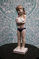 Royal Copenhagen porcelain figure of girl with rabbit, design by Sterett Kelsey.
RC# 5653...