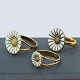 Georg Jensen Daisy rings ingold-plated sterling silver and white enamel. Produced by Georg ...