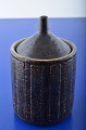 Palshus 
stoneware jam 
jar, with brown 
glaze, height 
with lid 15 cm. 
Diameter 8,5 
cm. Signed ...