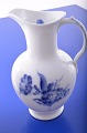 Royal 
Copenhagen 
porcelain. RC 
Blue flower 
braided. 
Chocolate 
pitcher nr. 
8147. Height 
23.5 cm. ...