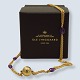 Ole Lynggaard 
gold jewellery.
Ole Lynggaard; 
A necklace in 
18k gold set 
with four 
amethysts and 
...