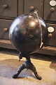 Decorative, 
antique globe 
in black on an 
iron base. The 
globe has been 
used for 
teaching about 
...