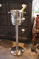 Old stand in chromed metal with champagne cooler/bucket at the top...