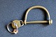 Antique lock, 
19th century in 
brass. Lock 
with key and 
stamp. 6.5 x 11 
cm.