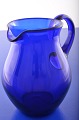 Holmegaard / 
Kastrup 
glassworks, 
milk jug of 
blue glass, 
height 15.8 cm. 
 Capacity 90.0 
cl. Fine ...