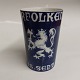 Mug or vase 
from Bing & 
Grøndahl. 
Decorated with 
the Norwegian 
Lion and the 
monogram of the 
...