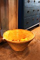 Decorative, 
large old 
handmade French 
clay dish 
"Tian'' 
from around 
1900. H: 21cm. 
Dia.: ...