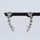 Georg Jensen; A 
pair of 
"Aurora" ear 
rings in 18k 
white gold, set 
with 
brillant-cut 
diamonds, ...