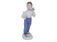 Bing & Grondahl 
figurine, girl 
with white 
teddy bear and 
bouquet of 
flowers.
The factory 
...