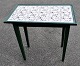 Antique Danish 
green-painted 
pine tile 
table, 19th 
century. With 
16.5 manganese 
colored tiles 
...