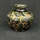 Height 9 cm.
Beautiful vase 
from Kähler 
decorated with 
greenish flower 
buds with blue 
flower ...