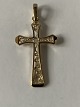 Cross pendant 
in 8 karat gold 

Stamped 333 
BNH
Height 37.85 
mm
Width 18.28 mm
Thickness ...