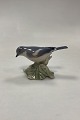 Royal 
Copenhagen 
Figurine of 
Bird - 
Flycatcher No. 
2144. Designed 
by Platen 
Hallermundt in 
1921. ...