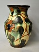 Danish 
ceramicist 
(20th century): 
Vase. Glazed 
earthenware. 
With glazes in 
green, brown, 
light ...