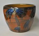 Danish 
ceramicist 
(20th century): 
Flower pot 
hides. Glazed 
earthenware. 
Glaze in brown, 
blue, ...