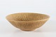 Carl-Harry 
Stålhane + 
Rörstrand
Round 
stoneware bowl 
decorated with
with ochre 
glaze with ...