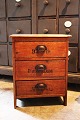 Nice little 
mini chest of 
drawers in wood 
from around 
1900 with 3 
drawers (with 
painted 
writing: ...
