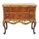 Walnut veneered 
and partly gilt 
commode made by 
the manufacture 
Köster, Altona, 
Northgermany, 
...