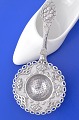 Danish silver 
with toweres 
marks, / 830 
silver. 
Tea strainer, 
length 18.2 cm. 
7 1/8 inches. 
...