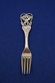 Michelsen 
Christmas 
spoons and 
forks of Danish 
gilt sterling 
silver or three 
Towers silver. 
...