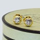 A pair of 
earrings, set 
with diamonds, 
mounted in 18k 
gold and white 
gold. Total 
app. 0,50 ...