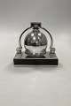 Georg Jensen 
Art Deco Table 
Bell on stand 
by Jørgen 
Jensen from 
1933-1944
The stand is 
made ...