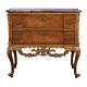 Walnut veneered 
and partly gilt 
marble top 
commode made by 
the manufacture 
Köster, Altona, 
...