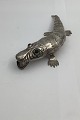 Alligator / 
crocodile in  
silver with 
moving body and 
eyes of Red 
glass flakes.
Measures 17cm 
...