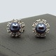 C. Antonsen; 
Pair of 
earrings in 18k 
white gold, 
with pearls and 
diamonds, total 
approx. 0.48 
...