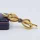 A Brooch of 18k gold set with sapphires