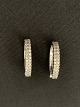 Silver earrings 
with inlaid 
clear stones
Stamped 925
Height 2.1 cm
See also our 
large ...