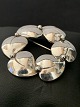 This beautiful 
brooch in 
sterling silver 
is made in a 
simple pattern, 
with 6 leaves 
in a circle. 
...