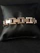 Gold bracelet 3 
rows block in 8 
carat gold. 
Very nice 
bracelet with 
chiselling in 
the middle ...