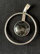 Beautiful 
pendant in 925 
sterling 
silver, made up 
of 2 concentric 
rings with a 
beautiful stone 
...