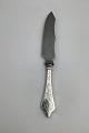Antik Rokoko 
Silver 
Cheeseknife
Measures 
20,5cm / 8.07 
inch