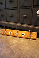 Old wooden coat rack with 3 metal coat hooks with 2 old number plates, no. 42 - 
44 in porcelain...