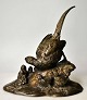 Unknown artist 
(20th century): 
Bronze figure 
of a pheasant 
with chickens. 
H: 22 cm. W: 
23.5 cm. ...