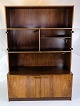This bookcase 
with a light 
display, made 
from rosewood 
and showcasing 
Danish design 
from the ...