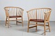 Hans J. Wegner 
(1914-2007)
Pair of 
armchairs model 
PP 112 
made of solid 
beech with 
paper ...