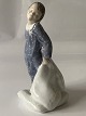 Beautiful and 
neat royal 
porcelain 
figure of a boy 
with pillow, 
from Royal 
Copenhagen, 
Holger ...
